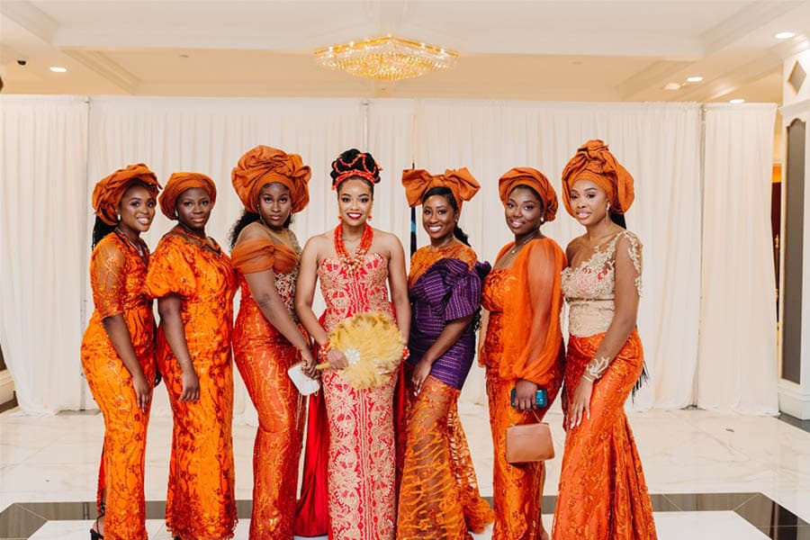 Bridesmaids in coordinated dresses at celebration