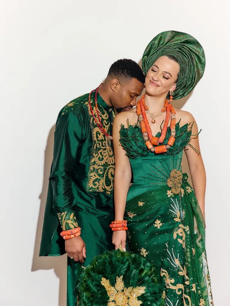 A couple dressed in traditional attire on their wedding day
